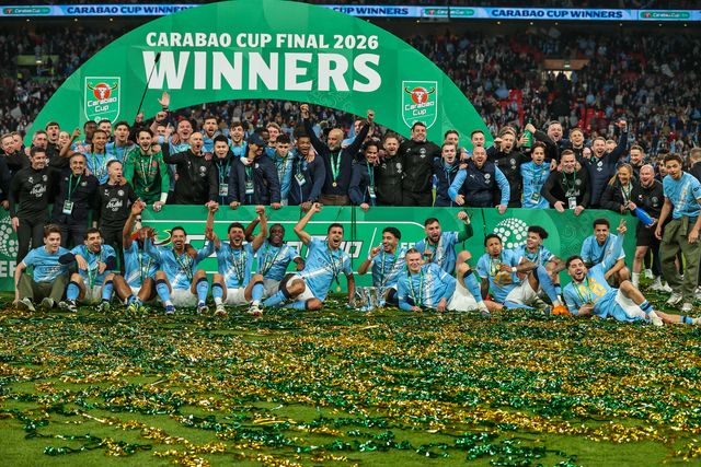 Manchester City players lift the trophy after the final whistle during the Carabao Cup Final match Arsenal vs Manchester City at Emirates, London, United Kingdom on 22 March 2026

(Photo by Alfie Cosgrove/News Images)