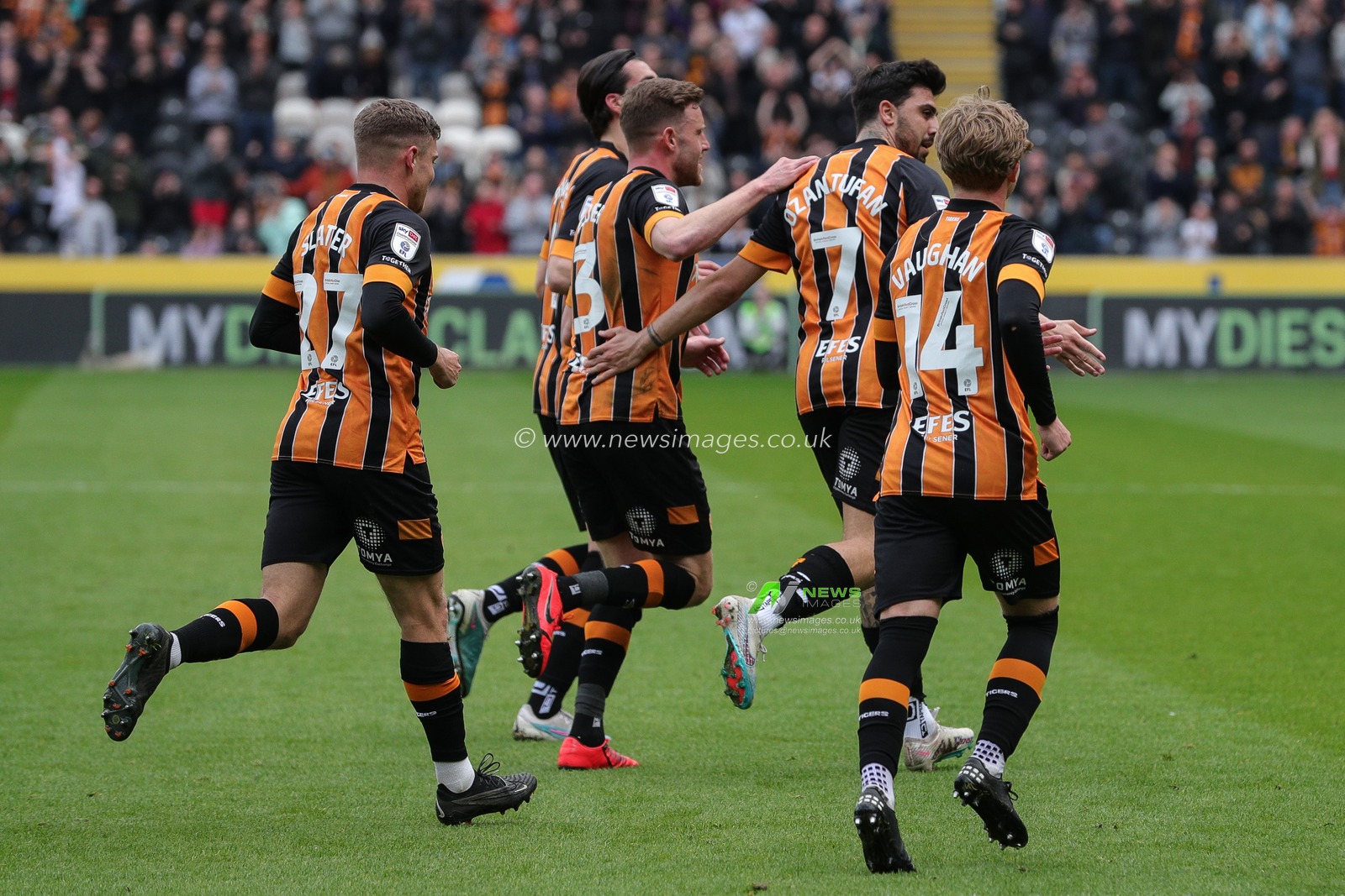 Ozan Tufan #7 of Hull City celebrates his goal with his team mates and makes the score 1-0 during the Sky Bet Championship match Hull City vs Watford at MKM Stadium, Hull, United Kingdom, 22nd April 2023

(Photo by James Heaton/News Images)