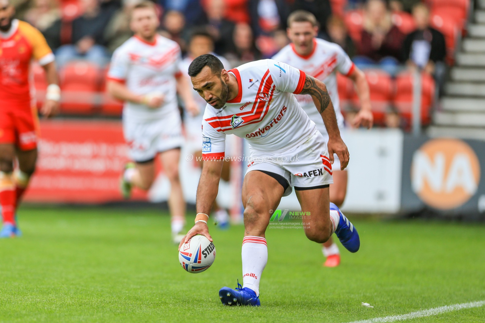 28th April 2019 , Totally Wicked Stadium, St Helens, England;  Betfred Super League, Round 13, St Helens vs Catalans Dragons ; Zeb Tala (11) of St Helens goes over for a try 

Credit: Mark Cosgrove/News Images