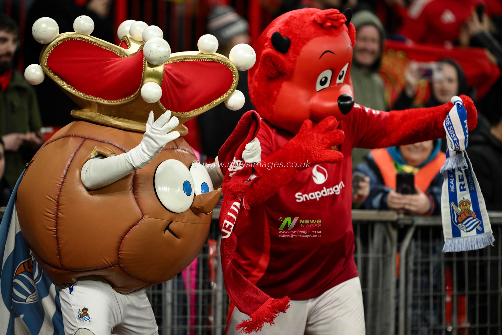 Real Sociedad mascot Txurdin and Fred the Red Manchester United mascot entertain the crowd during the UEFA Europa League Last 16 match Manchester United vs Real Sociedad at Old Trafford, Manchester, United Kingdom, 13th March 2025

(Photo by Craig Thomas/News Images)