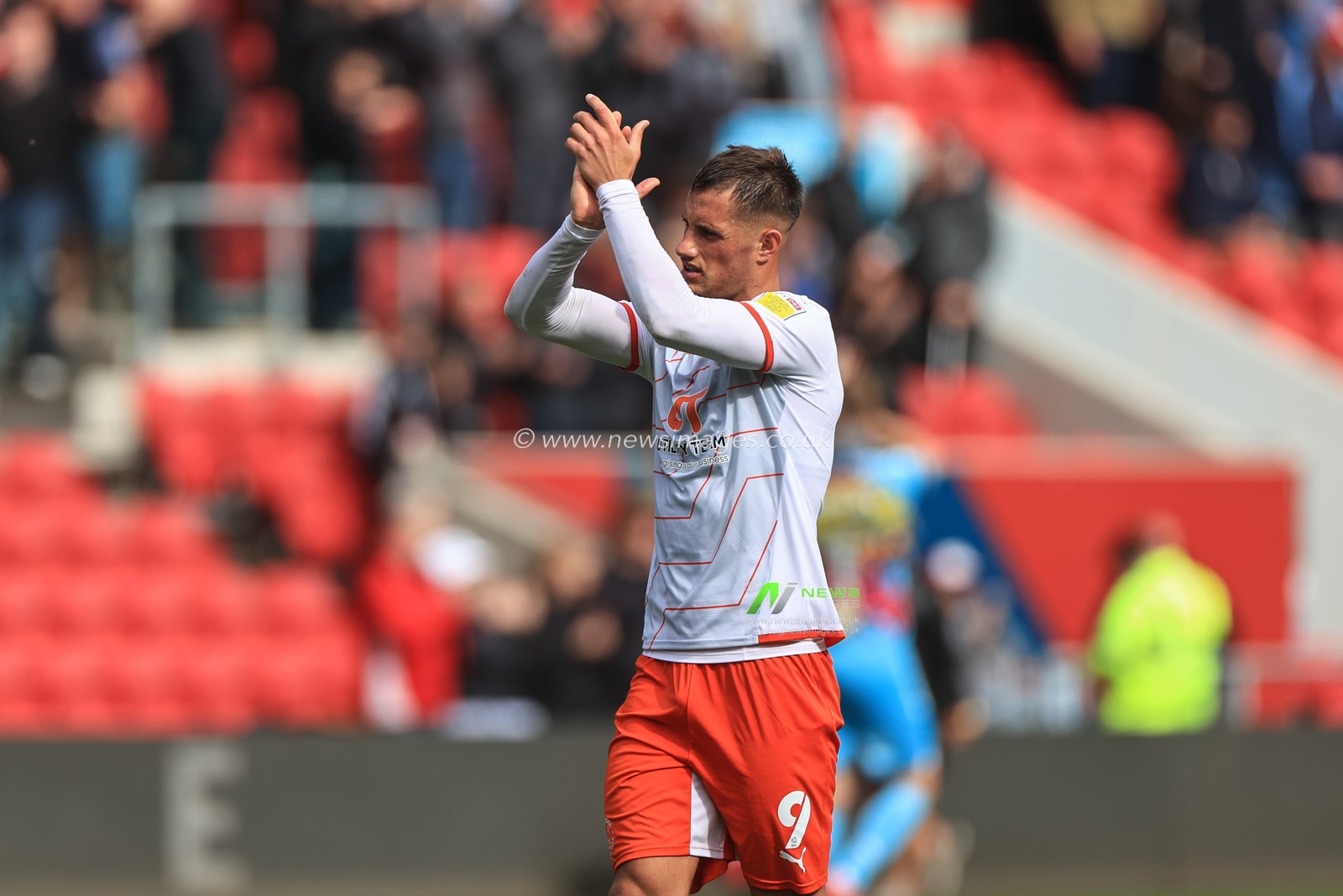Jerry Yates #9 of Blackpool applauds the traveling fans as Blackpool draw 1-1 with Bristol City