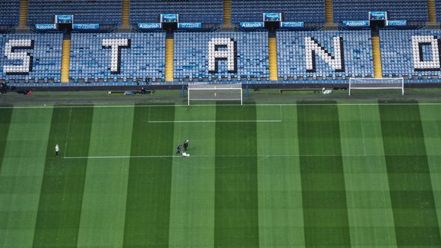 Ground staff mark the white lines around the penalty box during the Premier League match Leeds United vs Manchester City at Elland Road, Leeds, United Kingdom on 28 February 2026

(Photo by Mark Cosgrove/News Images)