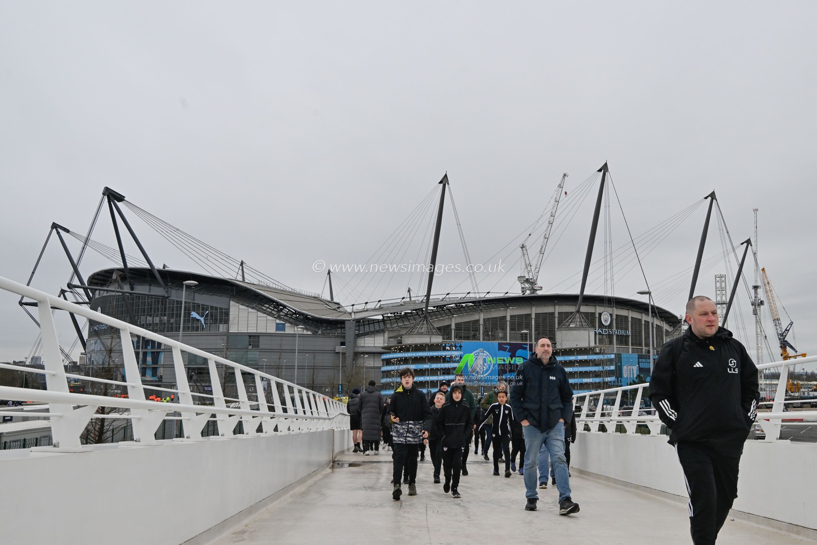 Fans arrive to the Etihad Stadium ahead of the Emirates FA Cup Quarter- Final match Manchester City vs Newcastle United at Etihad Stadium, Manchester, United Kingdom, 16th March 2024

(Photo by Cody Froggatt/News Images)