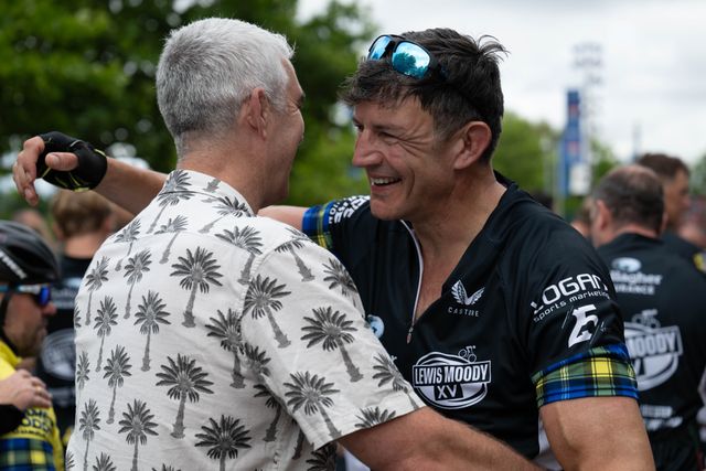 Martin Corey embraces a fan following the Lewis Moody XV  Cycle Challenge prior to the Gallagher PREM Final match Northampton Saints vs Exeter Chiefs at Allianz Stadium, Twickenham, United Kingdom on 20 June 2026.

(Photo by Alex Williamson/News Images)