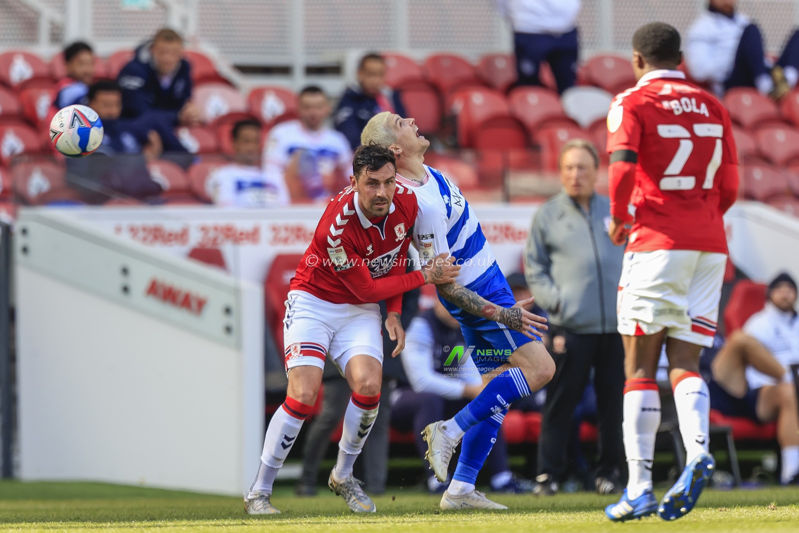 Grant Hall #4 of Middlesbrough in an aerial challenge with Lyndon Dykes #9 of Queens Park Rangers
