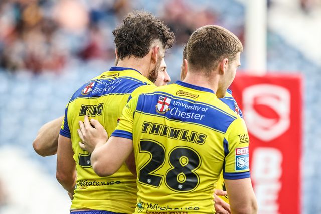 Toby King of Warrington Wolves celebrates his try during the Betfred Super League Round 23 match Huddersfield Giants vs Warrington Wolves at Accu Stadium, Huddersfield, United Kingdom, 24th August 2025

(Photo by Alfie Cosgrove/News Images)