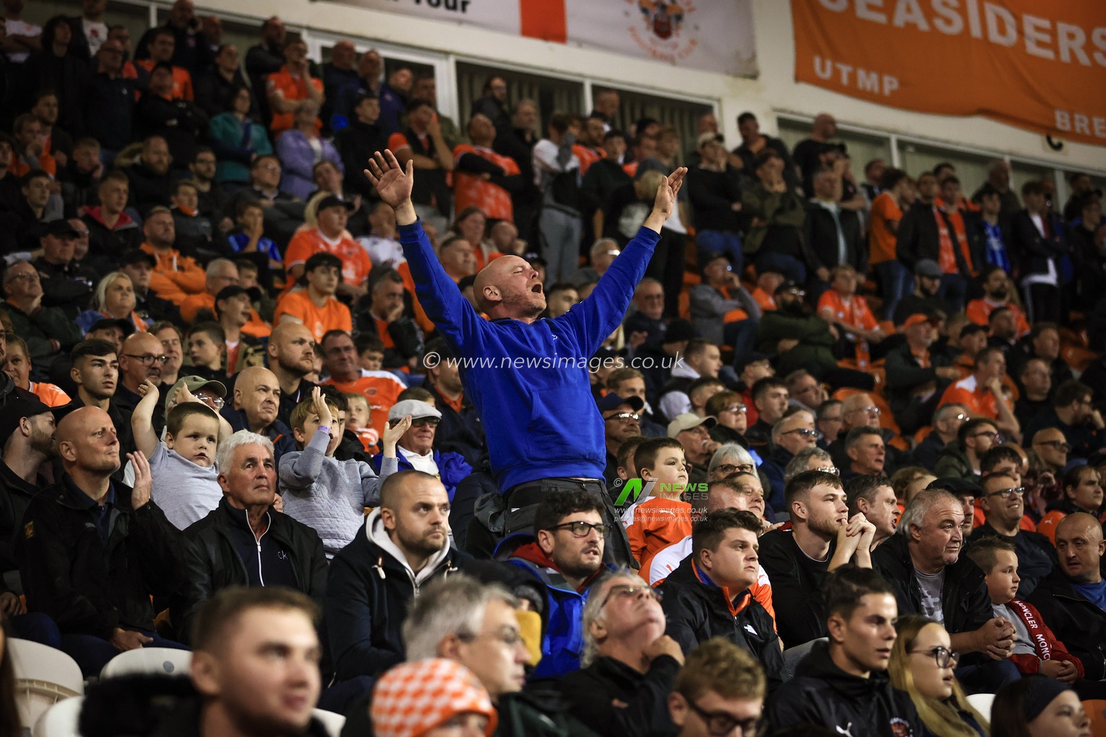 Blackpool fans watching the game