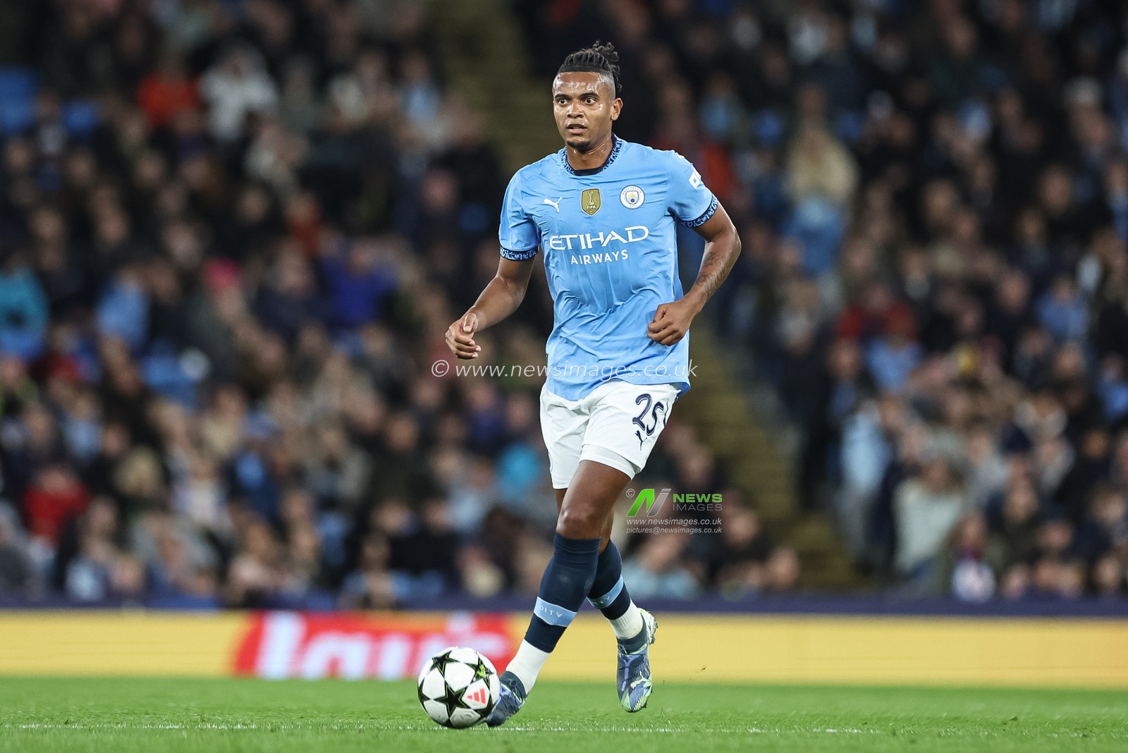 Manuel Akanji of Manchester City breaks with the ball during the UEFA Champions League, League Stage Manchester City v Sparta Prague at Etihad Stadium, Manchester, United Kingdom, 23rd October 2024

(Photo by Mark Cosgrove/News Images)