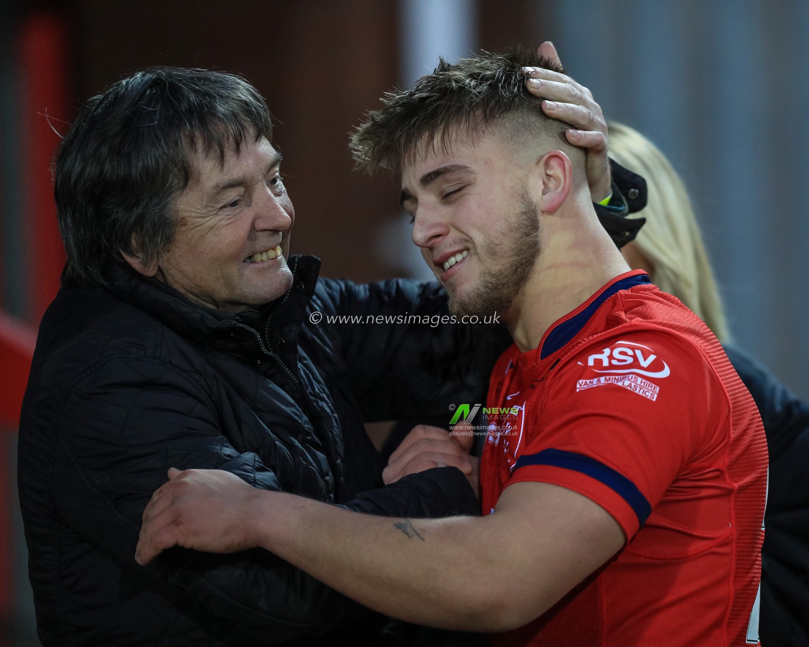 Mikey Lewis (20) of Hull KR  with family members after the win over Huddersfield Giants