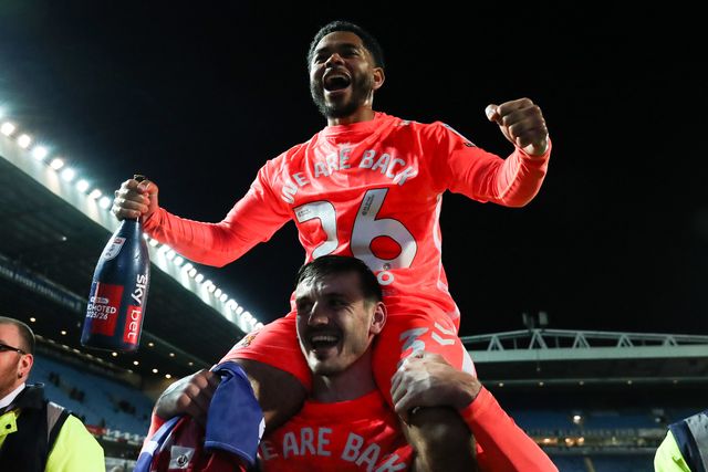 Jay Dasilva of Coventry City celebrates promotion back to the Premier League after the Sky Bet Championship match Blackburn Rovers vs Coventry City at Ewood Park, Blackburn, United Kingdom on 17 April 2026

(Photo by Jorge Horsted/News Images)