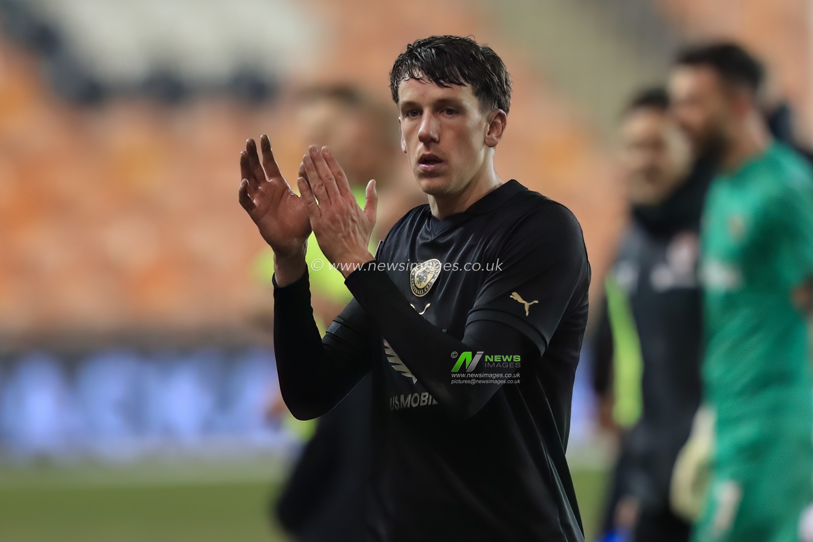 MaÃ«l de Gevigney #6 of Barnsley applauds the travelling fans after Barnsley lose 2-1 during the Bristol Street Motors Trophy match Blackpool vs Barnsley at Bloomfield Road, Blackpool, United Kingdom, 5th December 2023

(Photo by Alfie Cosgrove/News Images)