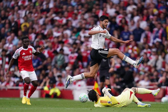 Arsenal goalkeeper David Raya slides in to win ball before Raul Jimenez of Fulham during the Premier League match Arsenal vs Fulham at Emirates, London, United Kingdom on 02 May 2026

(Photo by Harvey Murphy/News Images)