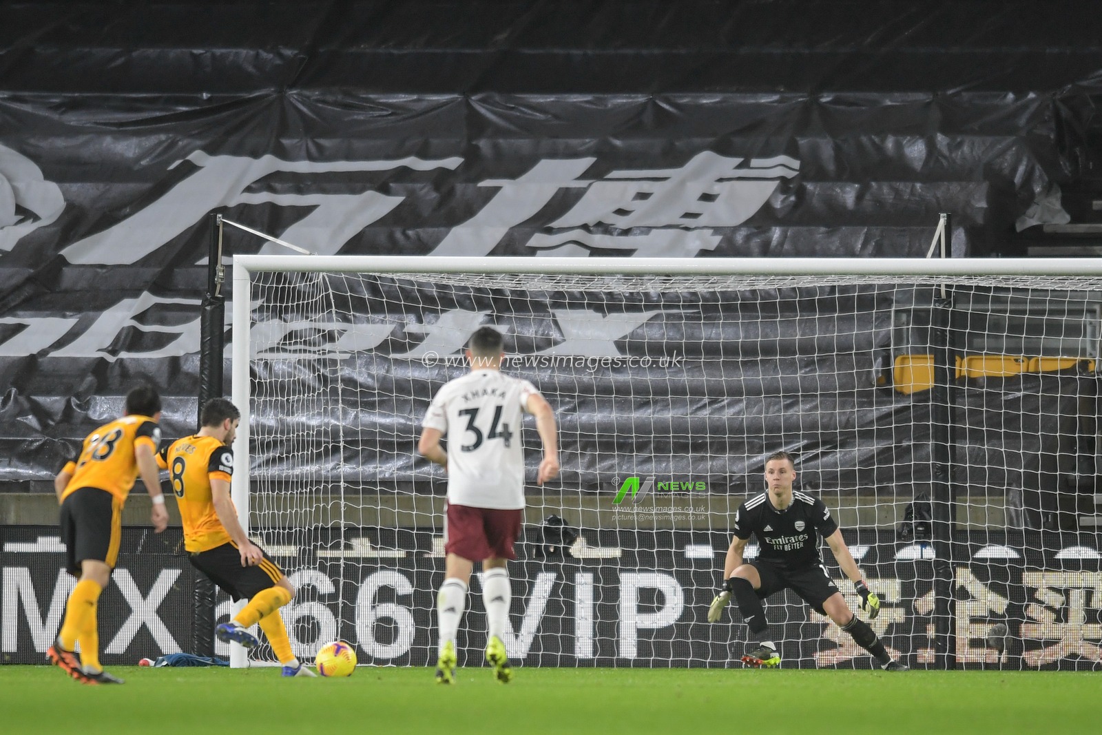 Ruben Neves #8 of Wolverhampton Wanderers scores a goal from the penalty spot to make it 1-1