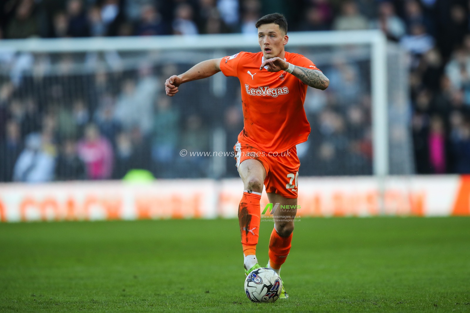 Oliver Casey of Blackpool goes forward with the ball during the Sky Bet League 1 match Derby County vs Blackpool at Pride Park Stadium, Derby, United Kingdom, 29th March 2024

(Photo by Gareth Evans/News Images)