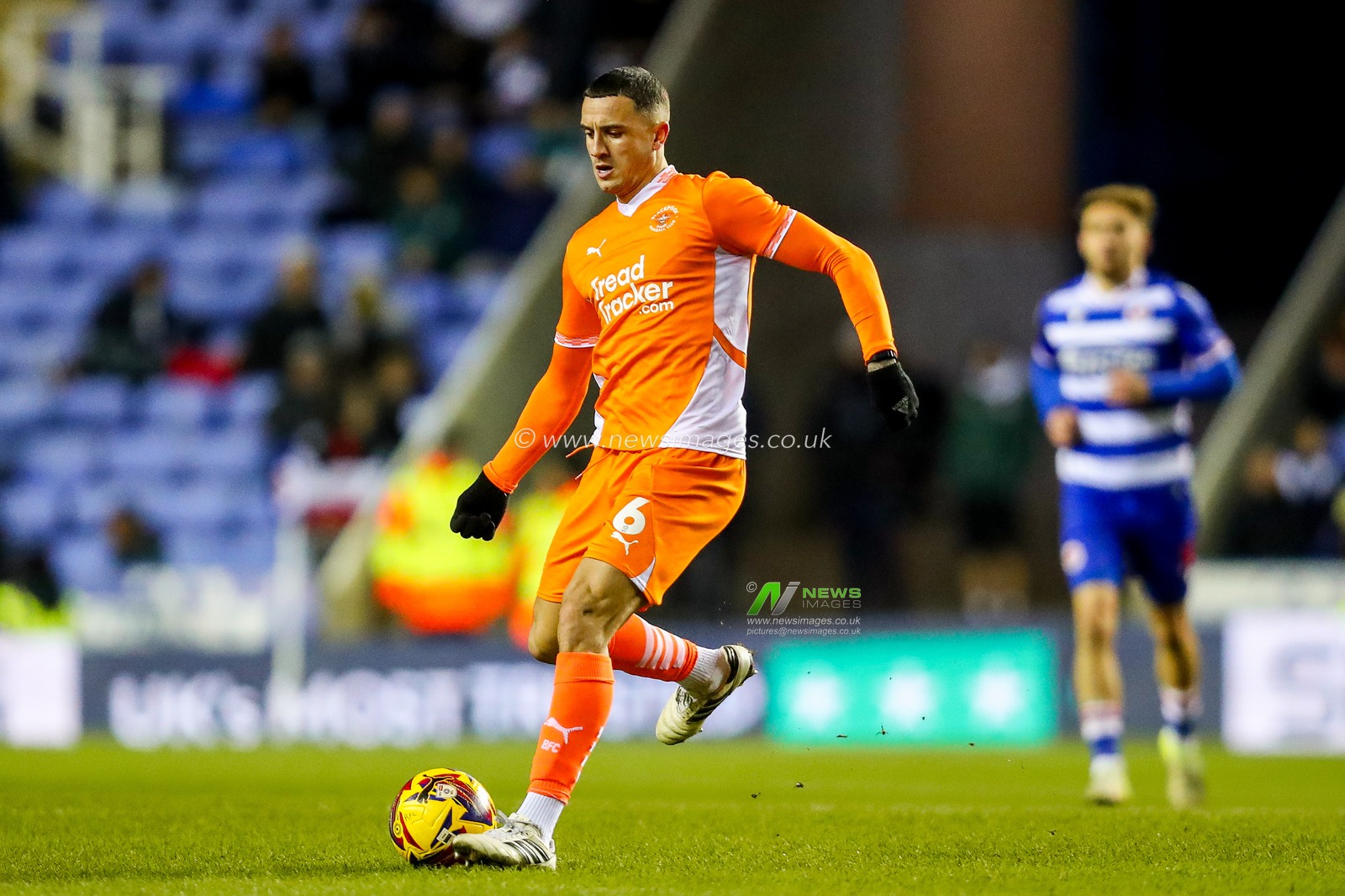 Oliver Norburn of Blackpool passes the ball during the Sky Bet League 1 match Reading vs Blackpool at Select Car Leasing Stadium, Reading, United Kingdom, 14th December 2024

(Photo by Izzy Poles/News Images)