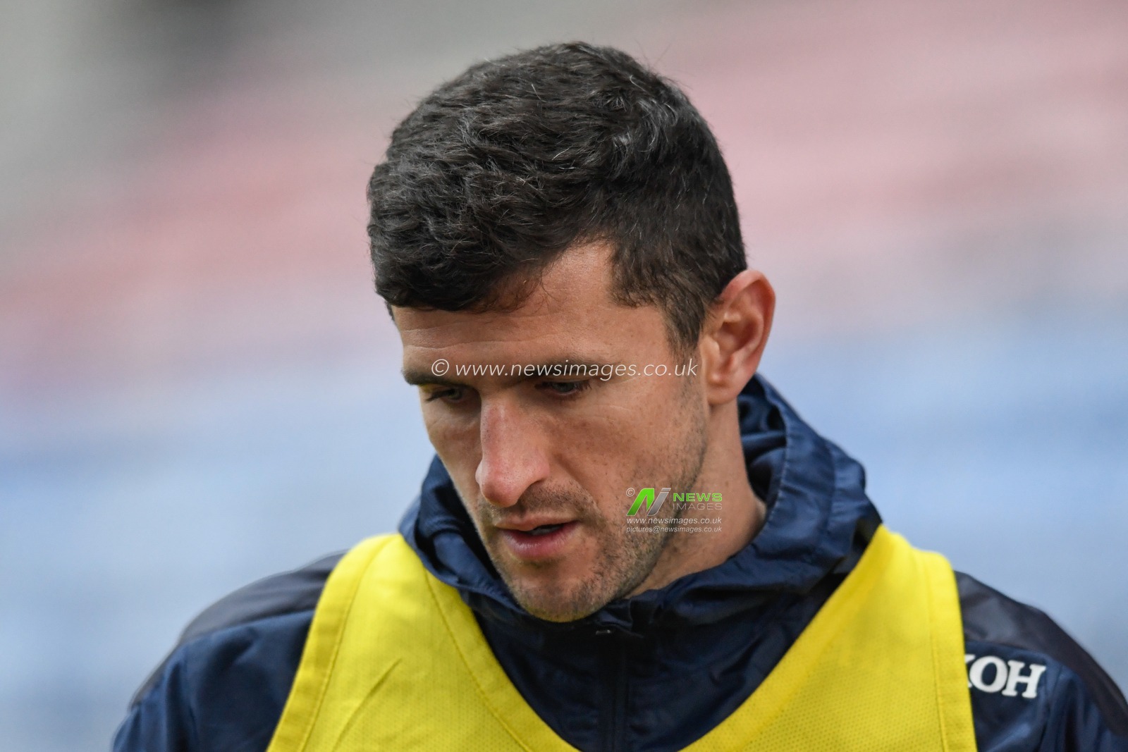 John Mousinho #15 of Oxford United warming up before the game