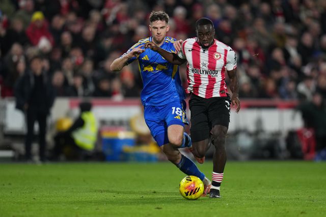 Michael Kayode of Brentford and Anton Stach of Leeds United during the Premier League match Brentford vs Leeds United at The Gtech Community Stadium, London, United Kingdom, 14th December 2025

(Photo by Harvey Murphy/News Images)

*** GER AUT SUI OUT ***