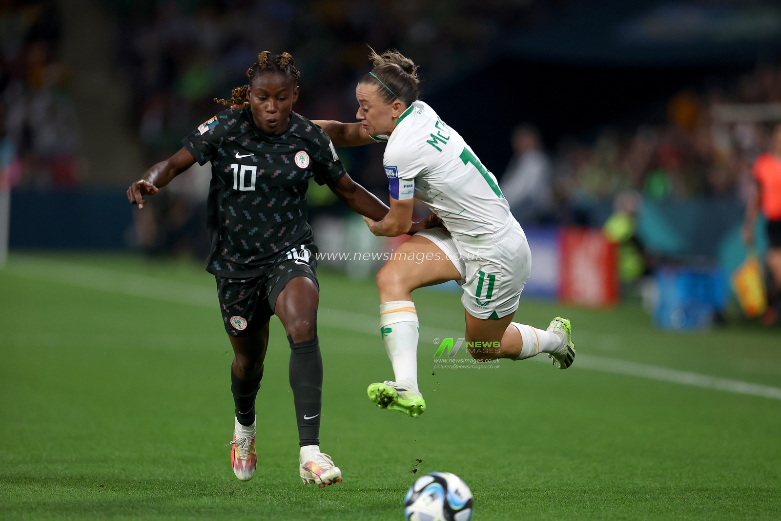 Katie McCabe of Ireland and Christy Ucheibe of Nigeria compete for the ball during the FIFA Women's World Cup 2023 Group B  match Ireland Women vs Nigeria Women at Suncorp Stadium, Brisbane, Australia, 31st July 2023

(Photo by Patrick Hoelscher/News Images)