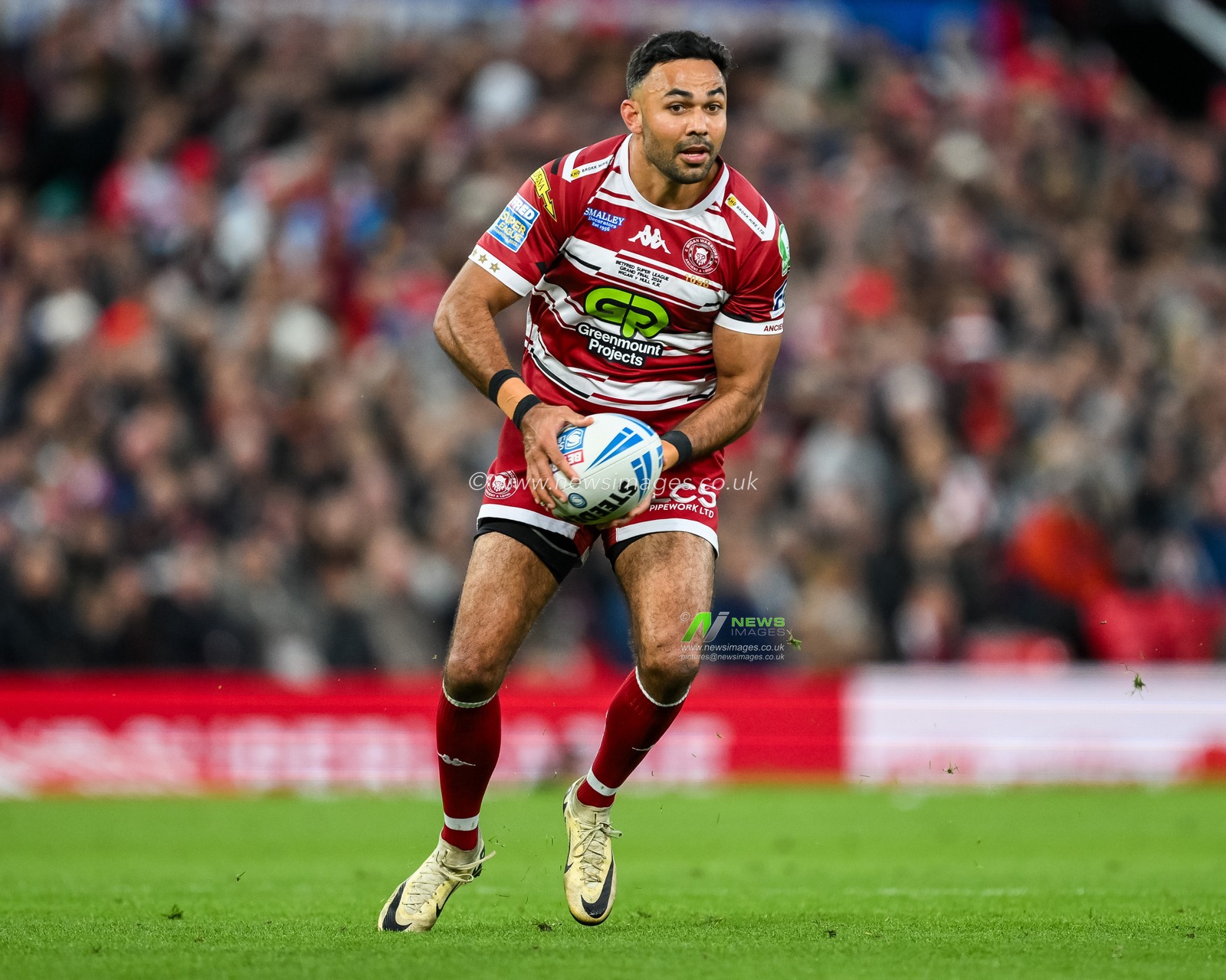 Bevan French of Wigan Warriors in action during the Betfred Super League Grand Final match Wigan Warriors vs Hull KR at Old Trafford, Manchester, United Kingdom, 12th October 2024

(Photo by Craig Thomas/News Images)