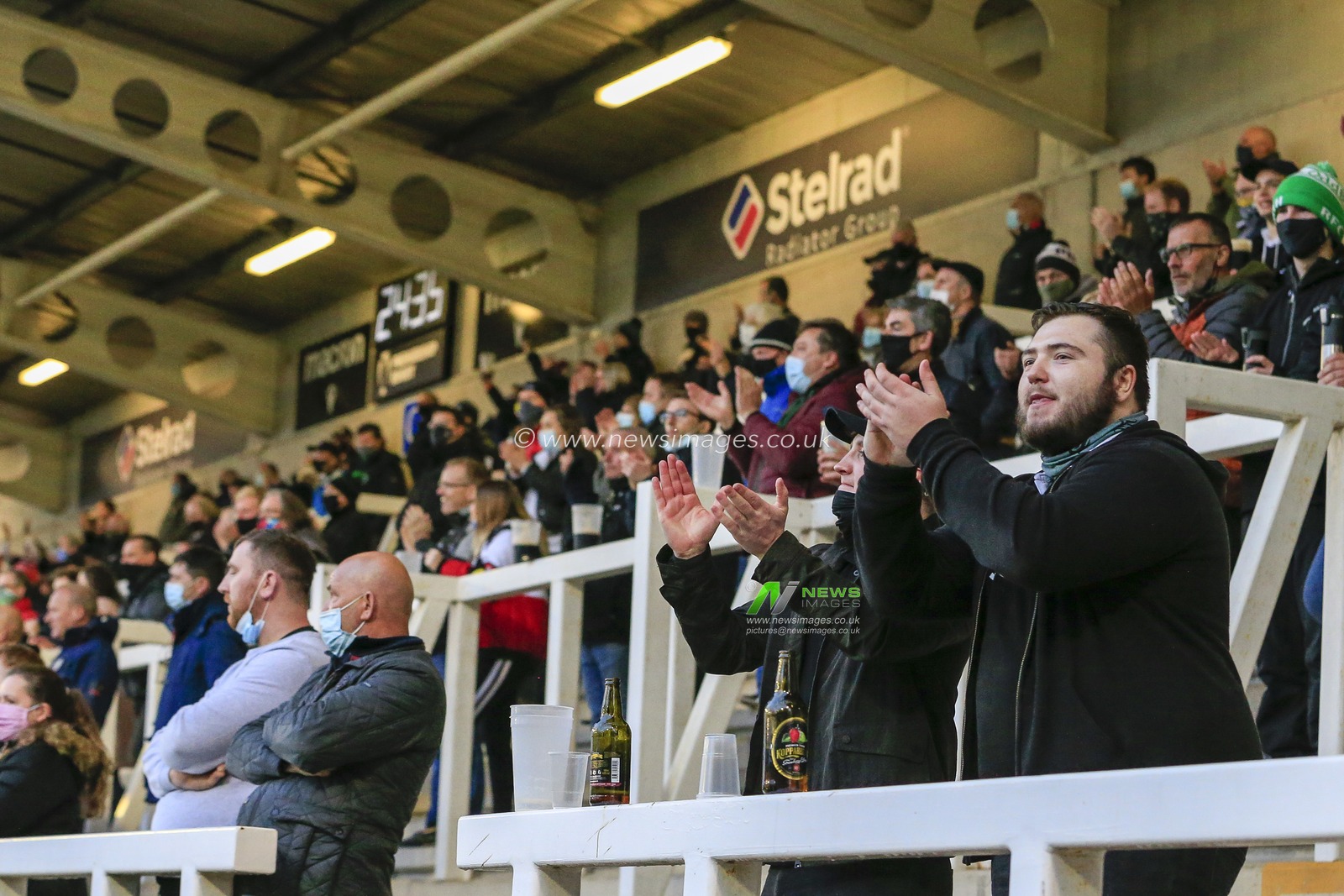 Fans applaud a try by Newcastle Falcons