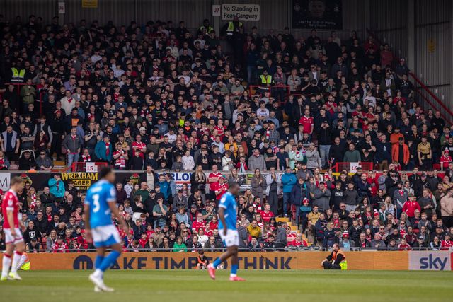 Wrexham fans during the Sky Bet League 1 match Wrexham vs Stockport County at SToK Cae Ras, Wrexham, United Kingdom, 22nd March 2025

(Photo by Nik Mesney/News Images)