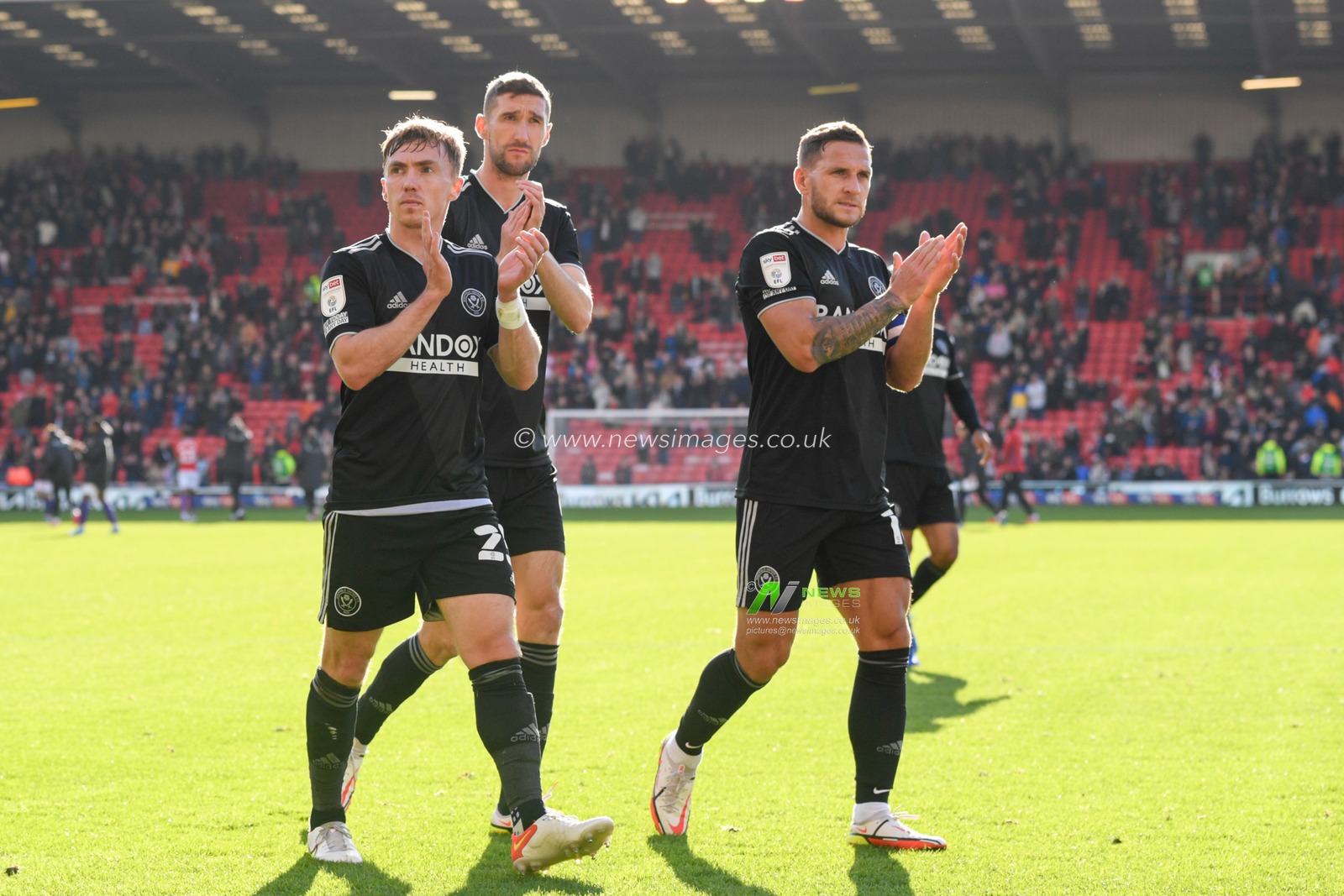 Ben Osborn #23 of Sheffield United applauds the travelling supporters at the end of the game after his side beat Barnsley 2-3