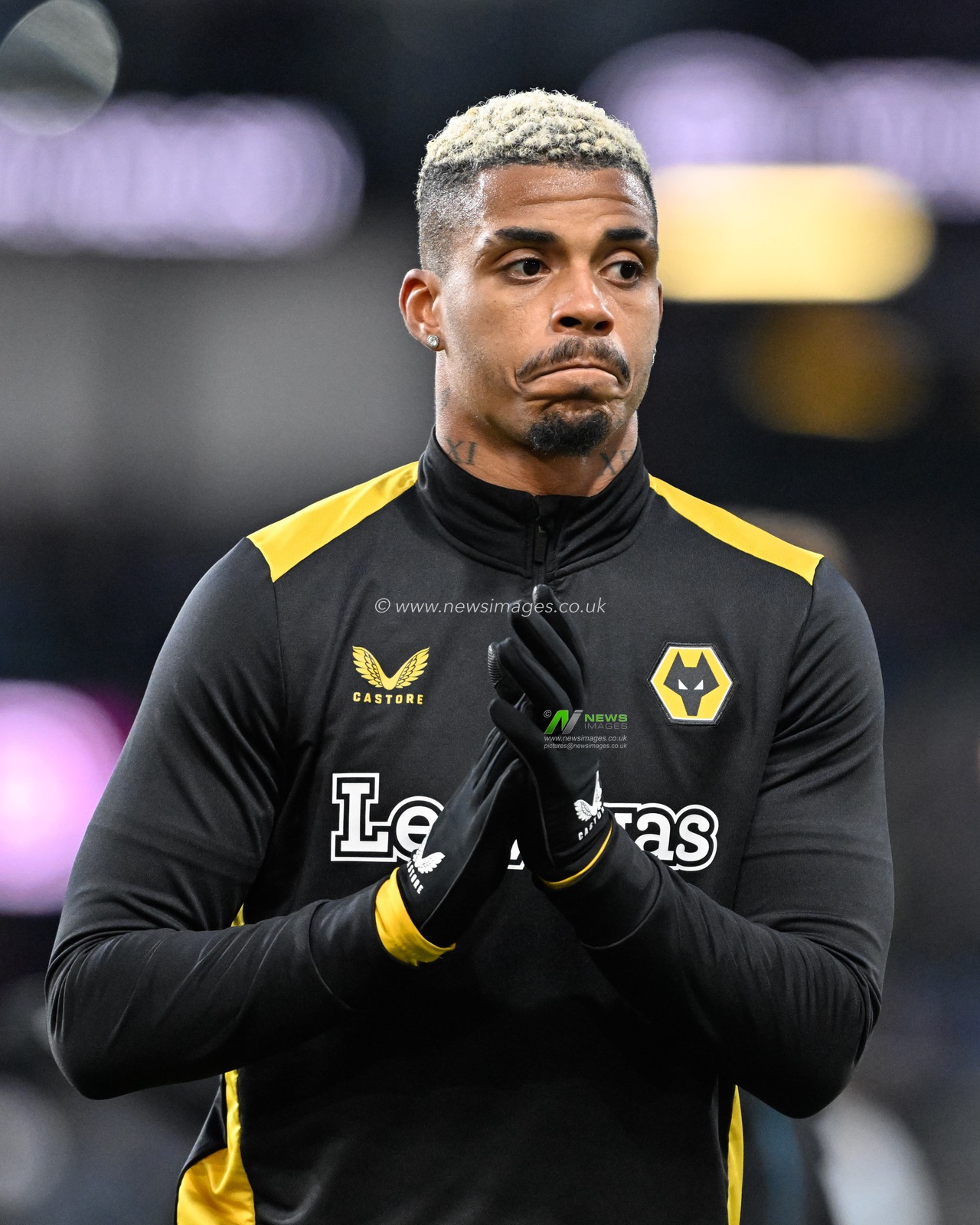 Mario Lemina of Wolverhampton Wanderers warms up ahead of the match, during the Premier League match Burnley vs Wolverhampton Wanderers at Turf Moor, Burnley, United Kingdom, 2nd April 2024

(Photo by Cody Froggatt/News Images)
