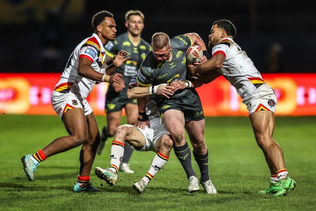 Tom Holroyd of Leeds Rhinos is tackled by Chris Atkin of Bradford Bulls and Esan Marsters of Bradford Bulls during the Betfred Super League round 7 match Bradford Bulls vs Leeds Rhinos at Odsal Stadium, Bradford, United Kingdom on 03 April 2026

(Photo by Alfie Cosgrove/News Images)
