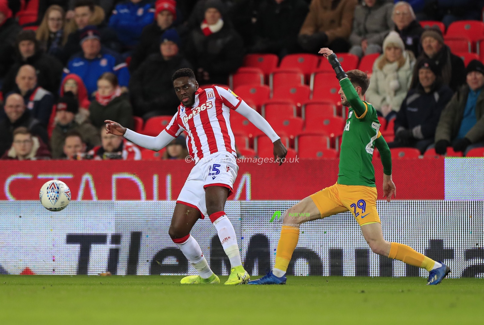 12th February 2020, Bet365 Stadium, Stoke-on-Trent, England; Sky Bet Championship, Stoke City v Preston North End : Tom Barkhuizen (29) of Preston North End and Bruno Martins Indi (15) of Stoke City challenge for the ball