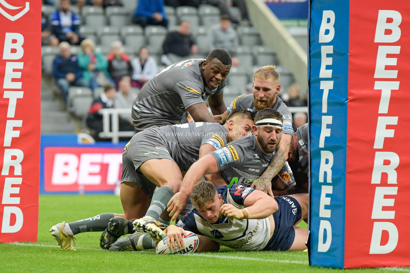 Morgan Knowles (13) of St Helens goes over for a try to make it 28-12