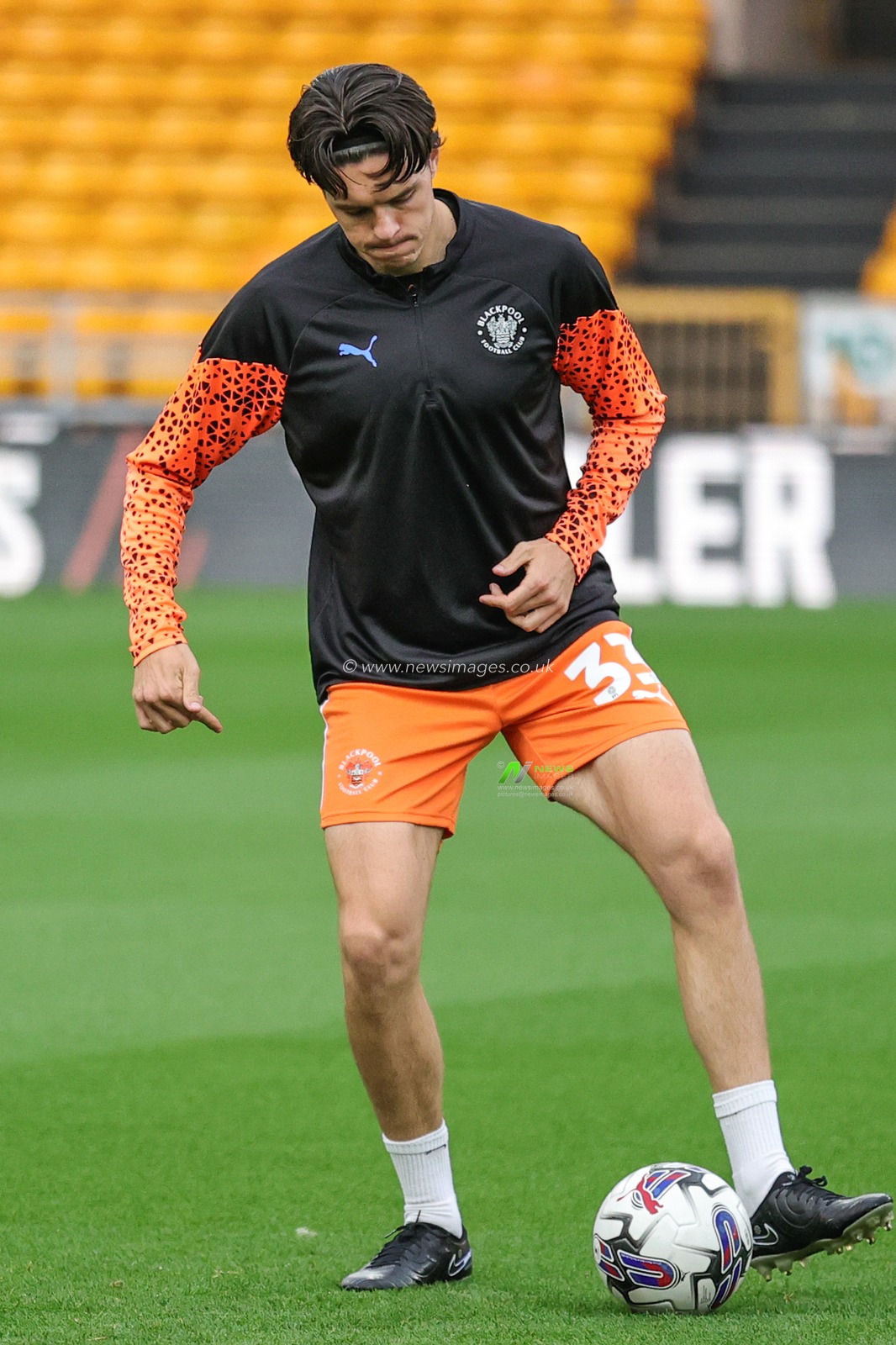 Doug Tharme #33 of Blackpool in the pregame warmup session during the Carabao Cup match Wolverhampton Wanderers vs Blackpool at Molineux, Wolverhampton, United Kingdom, 29th August 2023

(Photo by Mark Cosgrove/News Images)