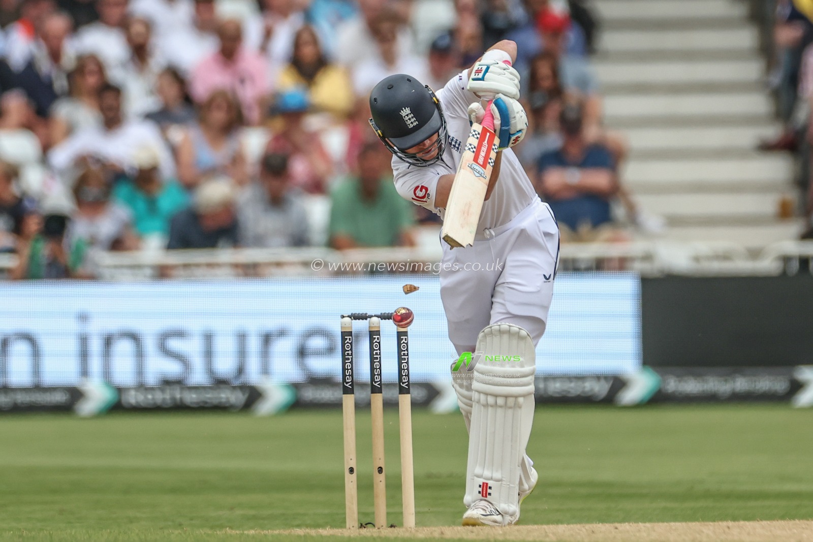 Ollie Pope of England hits the ball and shatters his bat during the Rothesay Test Match day three England vs West Indies at Trent Bridge, Nottingham, United Kingdom, 20th July 2024

(Photo by Mark Cosgrove/News Images)