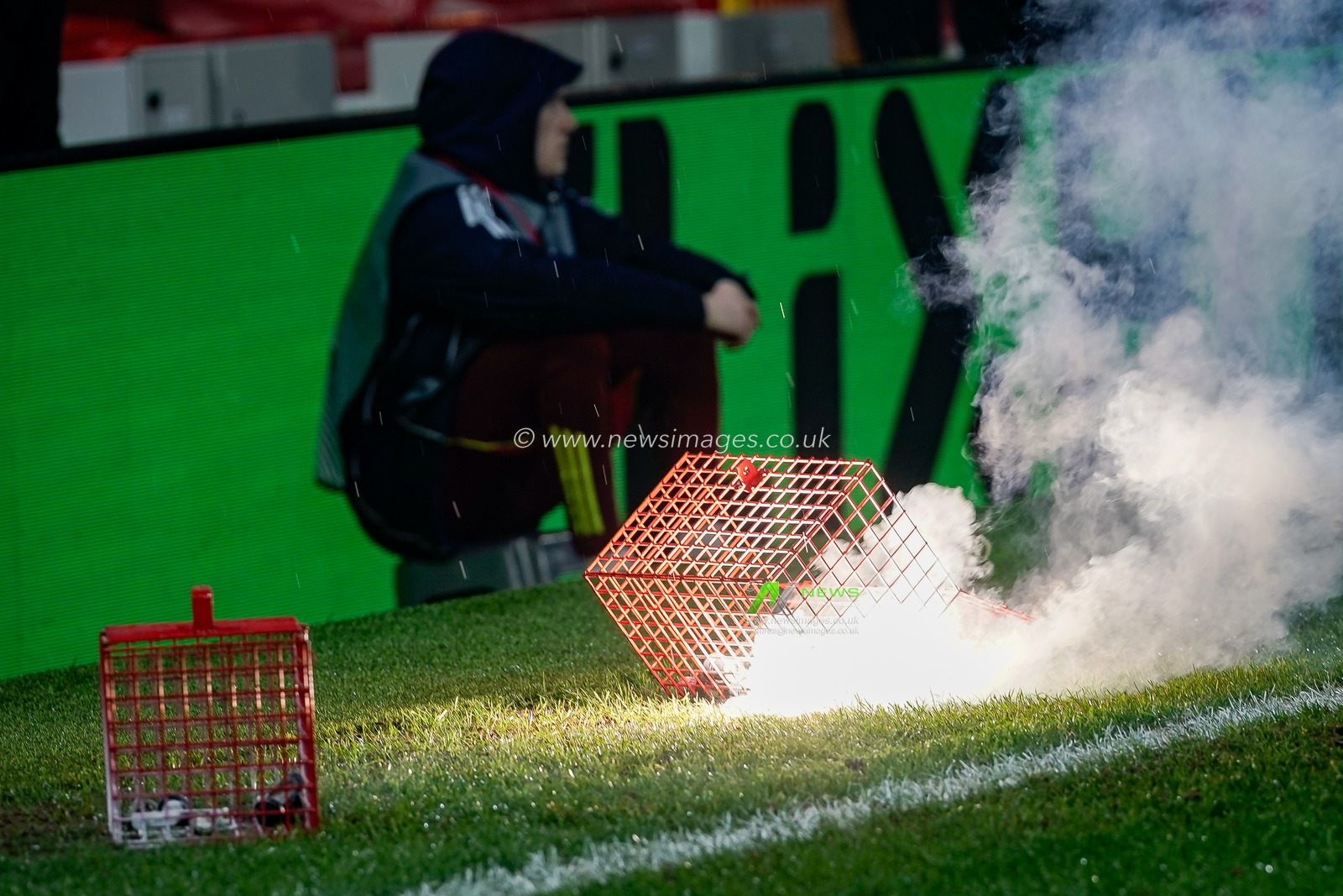 Stewards battle to contain flares thrown on to the pitch prior to kick off during the UEFA Europa League 
Knockout Round Play-offs match Nottingham Forest vs Fenerbahce at City Ground, Nottingham, United Kingdom on 26 February 2026

(Photo by Maynard Manyowa/News Images)