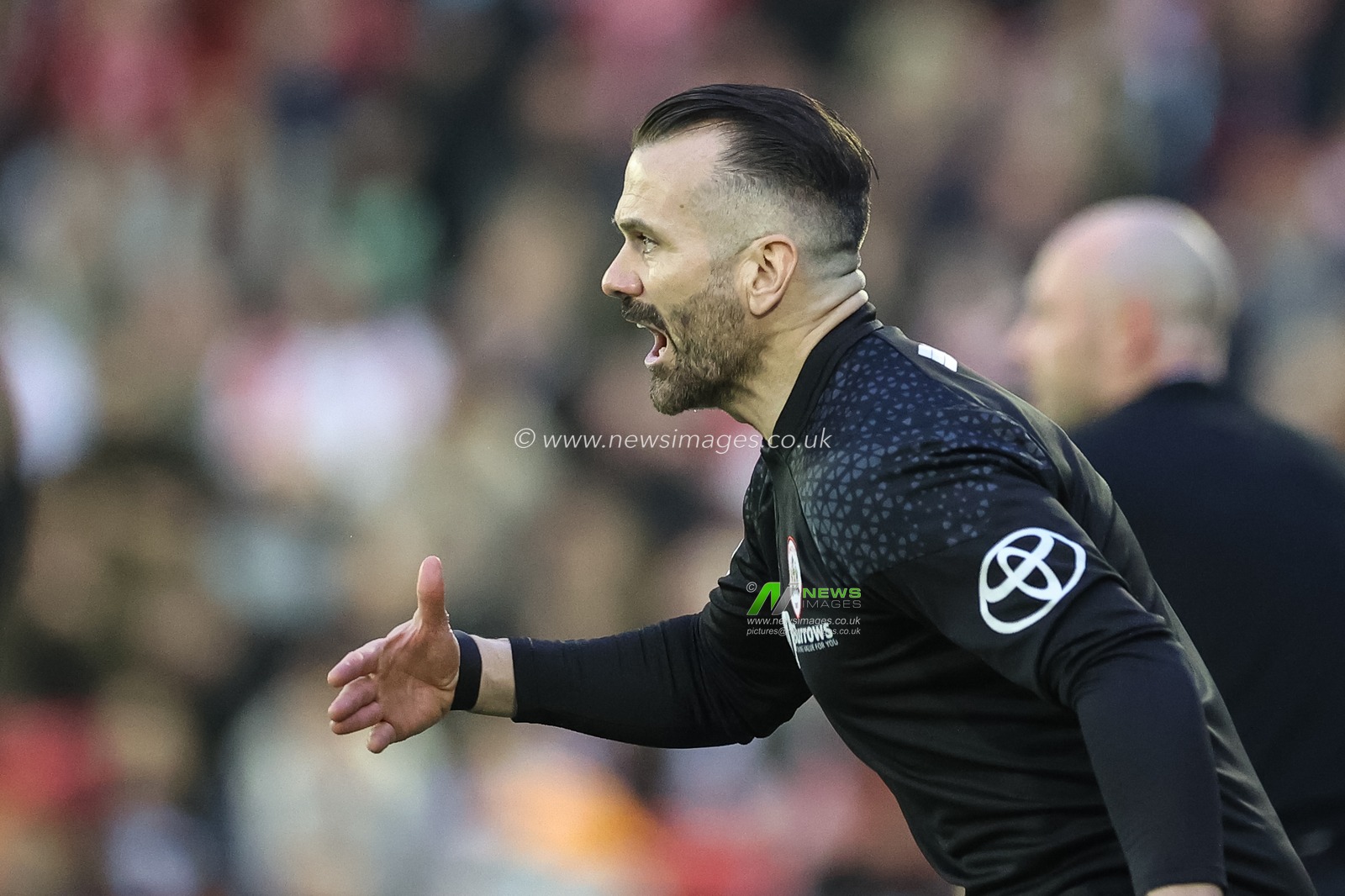 Martin Devaney caretaker manager of Barnsley reacts in the technical area during the Sky Bet League 1 Promotion Play-offs Semi-final first leg match Barnsley vs Bolton Wanderers at Oakwell, Barnsley, United Kingdom, 3rd May 2024

(Photo by Mark Cosgrove/News Images)