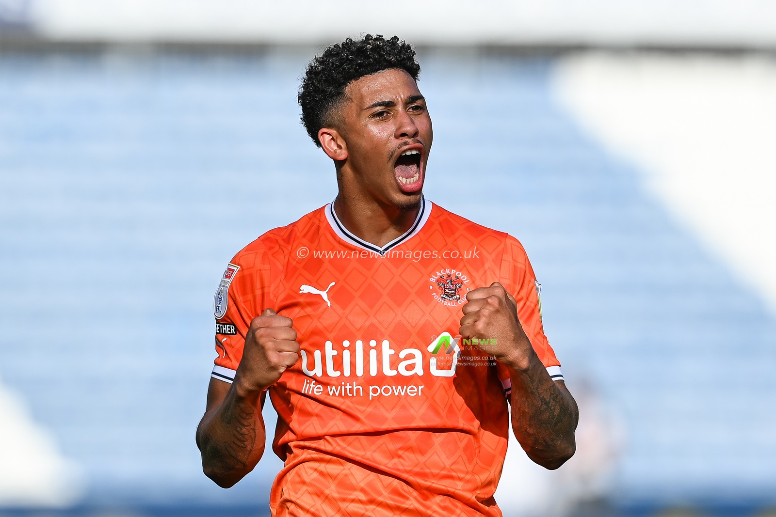 Jordan Lawrence-Gabriel #4 of Blackpool celebrates with the fans at the end of the Sky Bet Championship match Huddersfield Town vs Blackpool at John Smith's Stadium, Huddersfield, United Kingdom, 4th September 2022

(Photo by Craig Thomas/News Images)