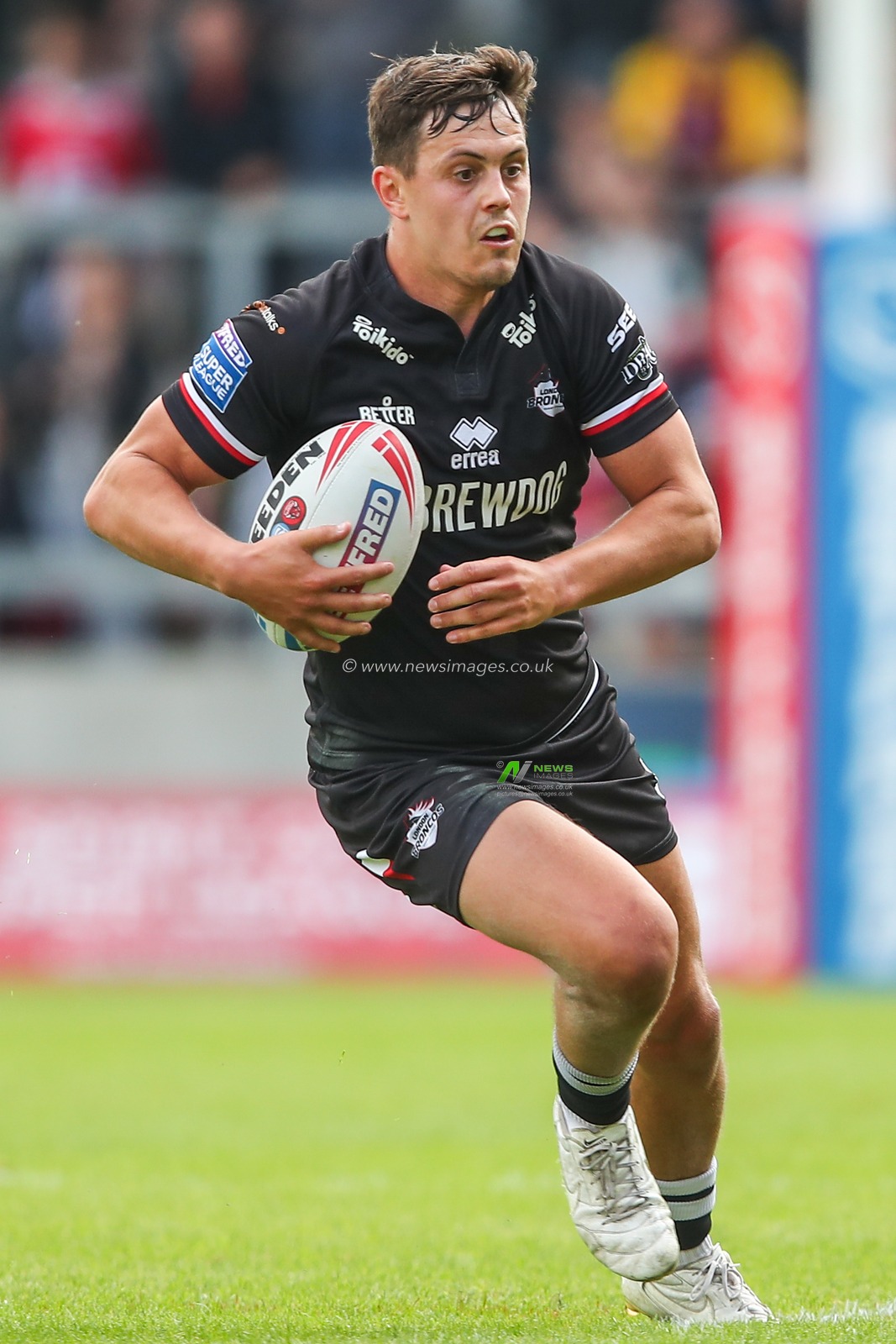 Alex Walker of London Broncos breaks with the ball during the Betfred Super League Round 13 match Salford Red Devils vs London Broncos at Salford Community Stadium, Eccles, United Kingdom, 2nd June 2024

(Photo by Gareth Evans/News Images)