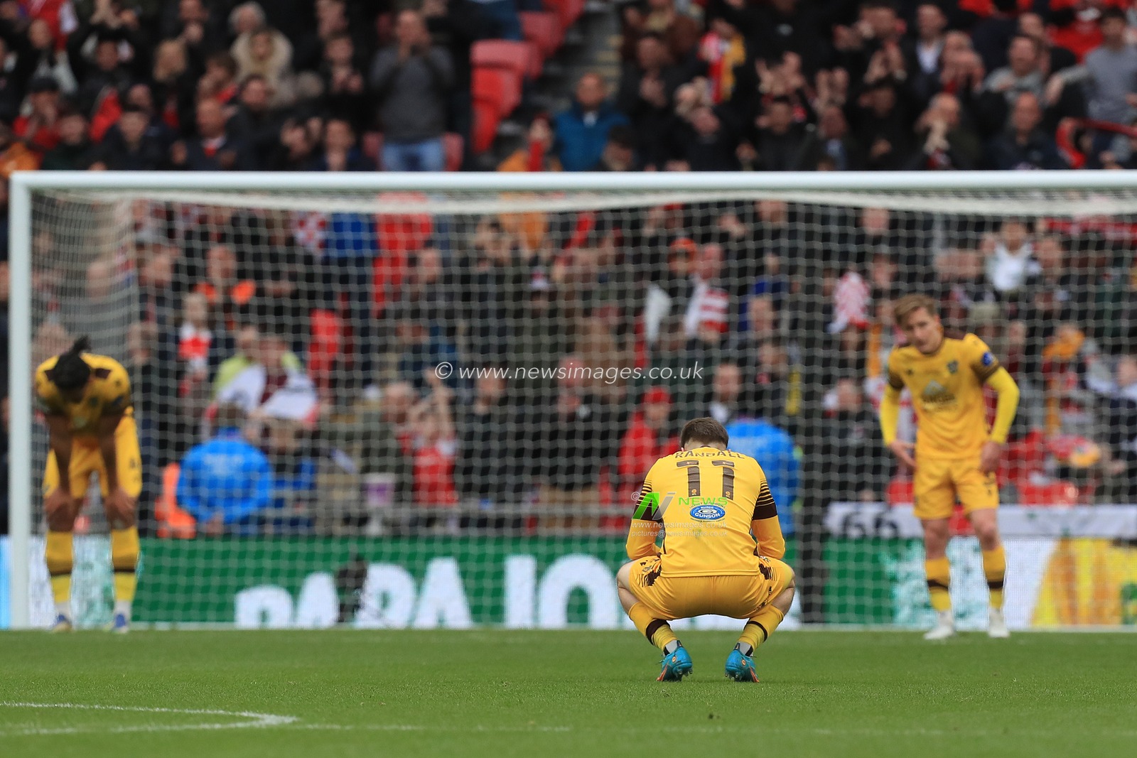 Dejected Sutton United players at the final whistle.