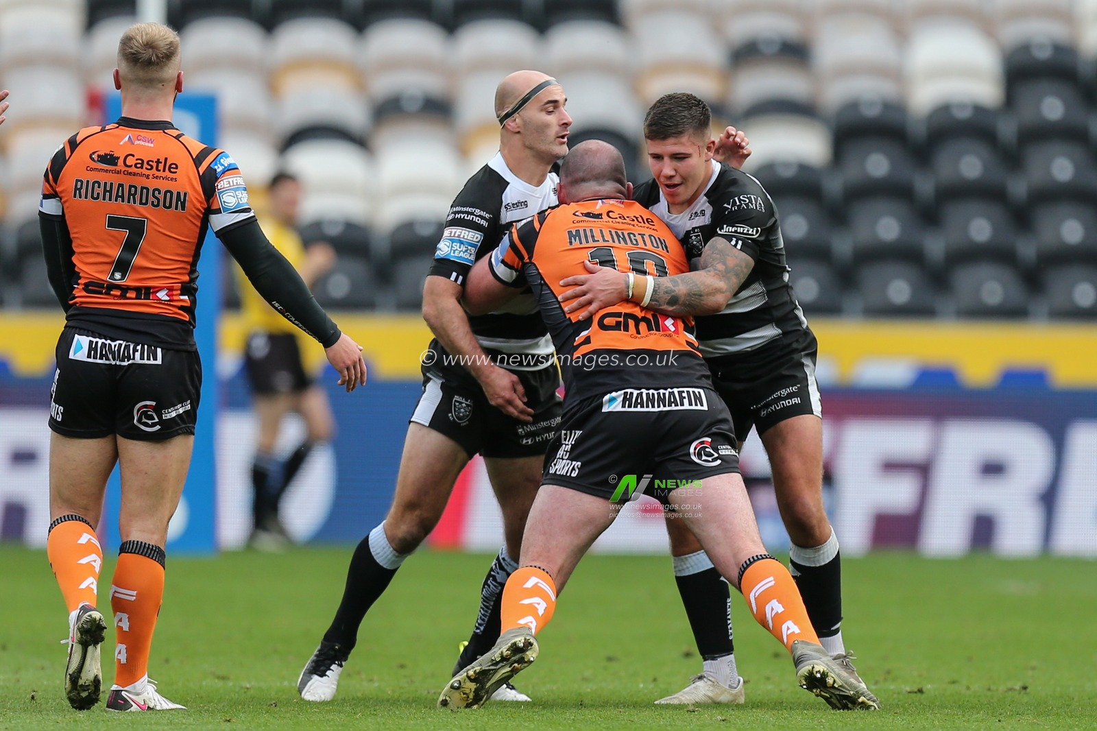 Danny Houghton (9) of Hull FC and Joe Cator (15) of Hull FC in defensive duties