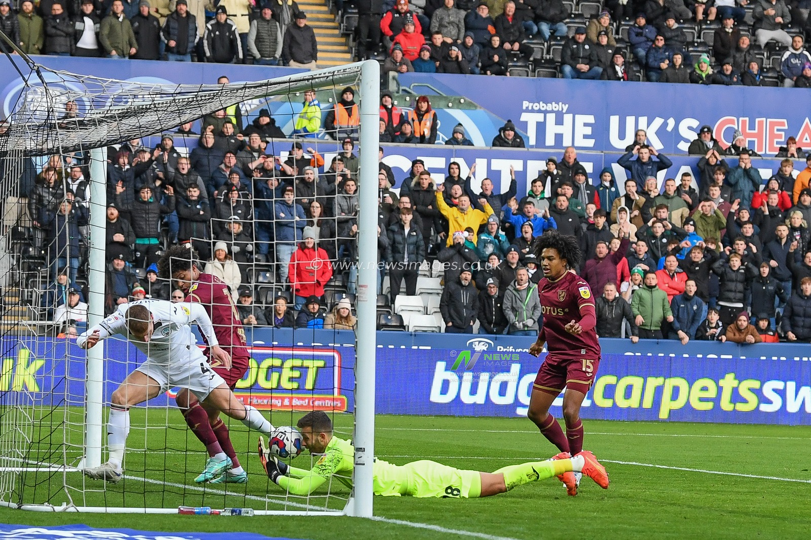 Angus Gunn #28 of Norwich City saves from Jay Fulton #4 of Swansea City during the Sky Bet Championship match Swansea City vs Norwich City at Swansea.com Stadium, Swansea, United Kingdom, 10th December 2022

(Photo by Mike Jones/News Images)