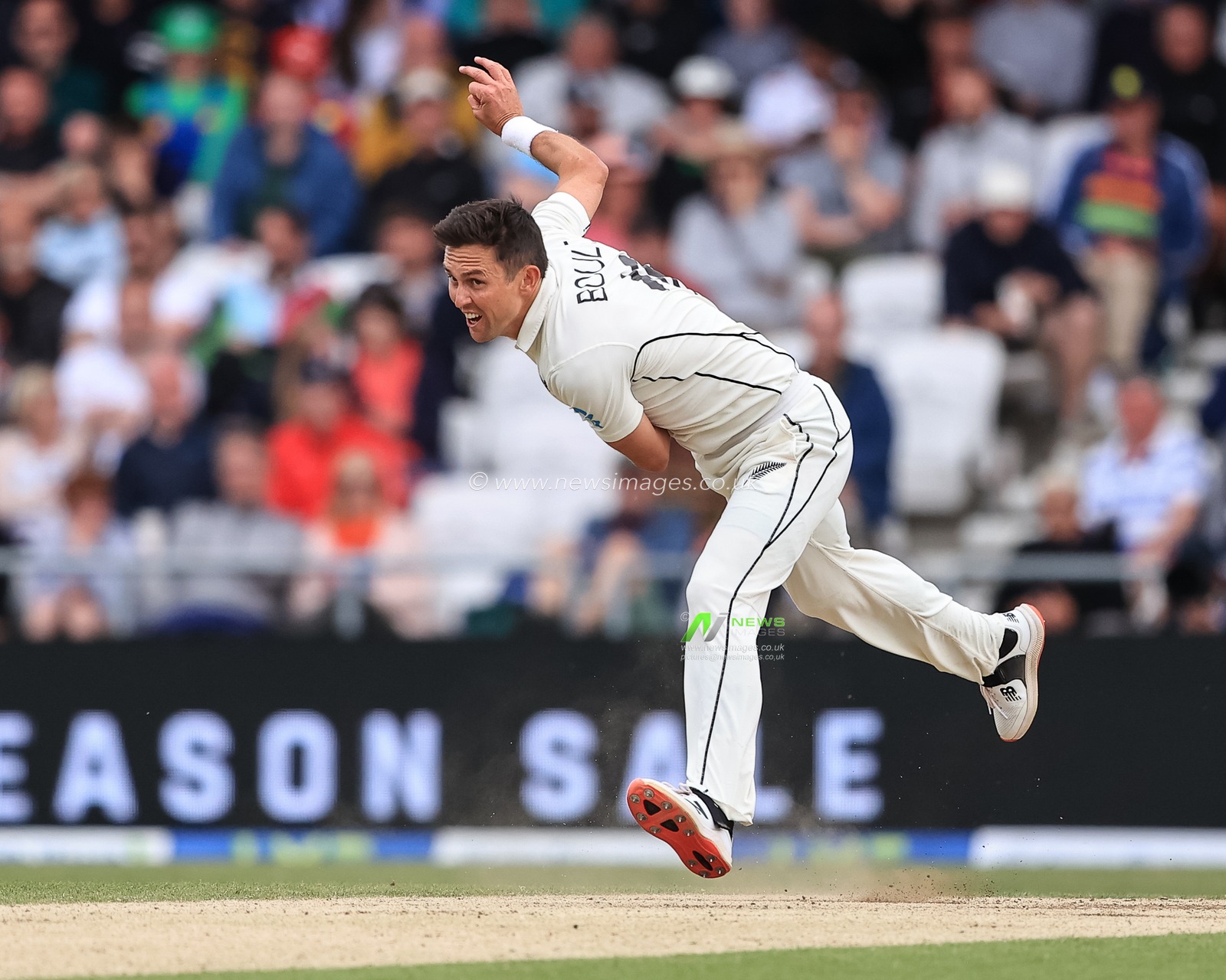 Trent Boult of New Zealand delivers the ball