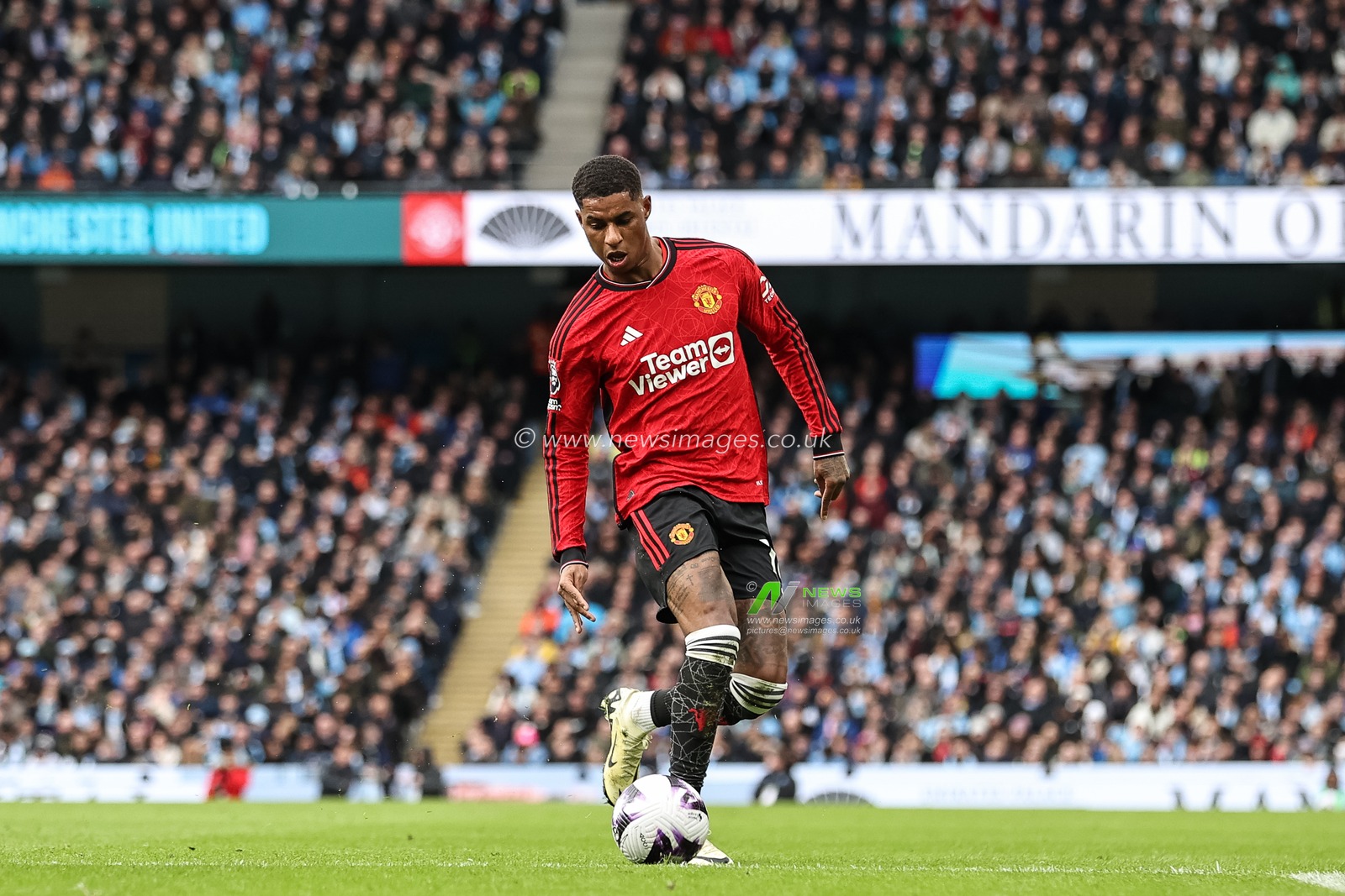 Marcus Rashford of Manchester United with the ball during the Premier League match Manchester City vs Manchester United at Etihad Stadium, Manchester, United Kingdom, 3rd March 2024

(Photo by Mark Cosgrove/News Images)