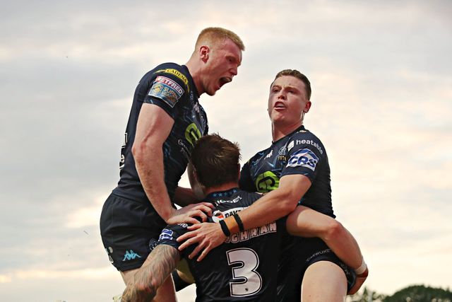 Adam Keighran of Wigan Warriors celebrates his try with Zach Eckersley of Wigan Warriors and Jai Field of Wigan Warriors during the Betfred Super League round 15 match Wakefield Trinity vs Wigan Warriors at DIY Kitchens Stadium, Wakefield, United Kingdom, 20th June 2025(Photo by Sam Eaden/News Images)