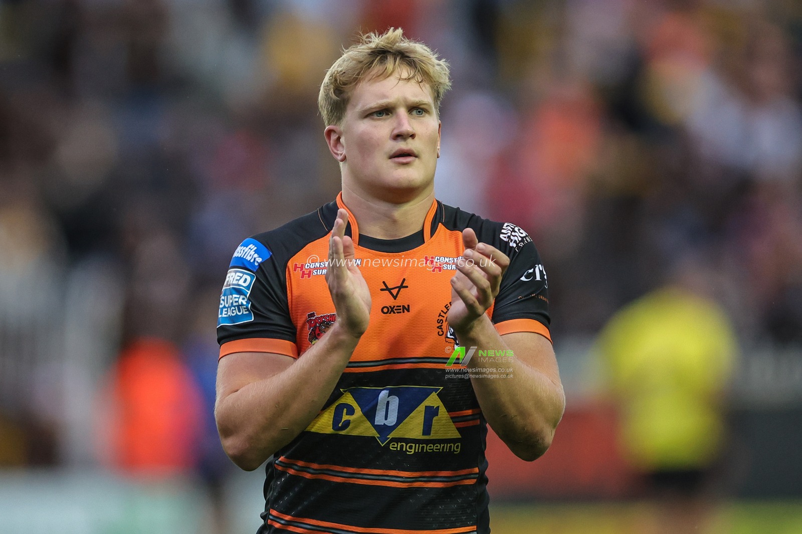 Try scorer Will Tate #39 of Castleford Tigers applauds the fans during the Betfred Super League Round 16 match Castleford Tigers vs Warrington Wolves at The Mend-A-Hose Jungle, Castleford, United Kingdom, 23rd June 2023

(Photo by Mark Cosgrove/News Images)