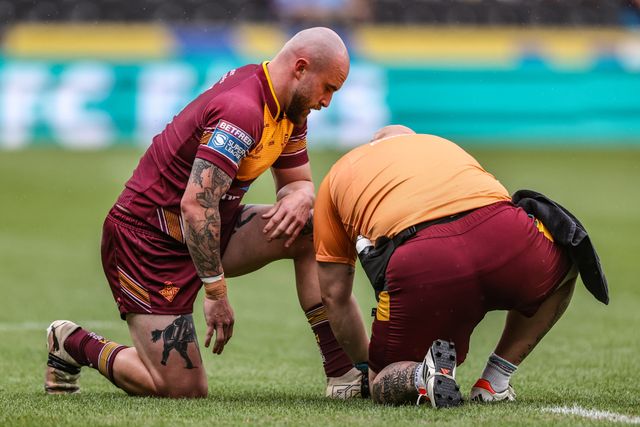 Jake Bibby of Huddersfield Giants receives treatment during the Betfred Super League round 20 match Hull FC vs Huddersfield Giants at MKM Stadium, Hull, United Kingdom, 26th July 2025

(Photo by Alfie Cosgrove/News Images)