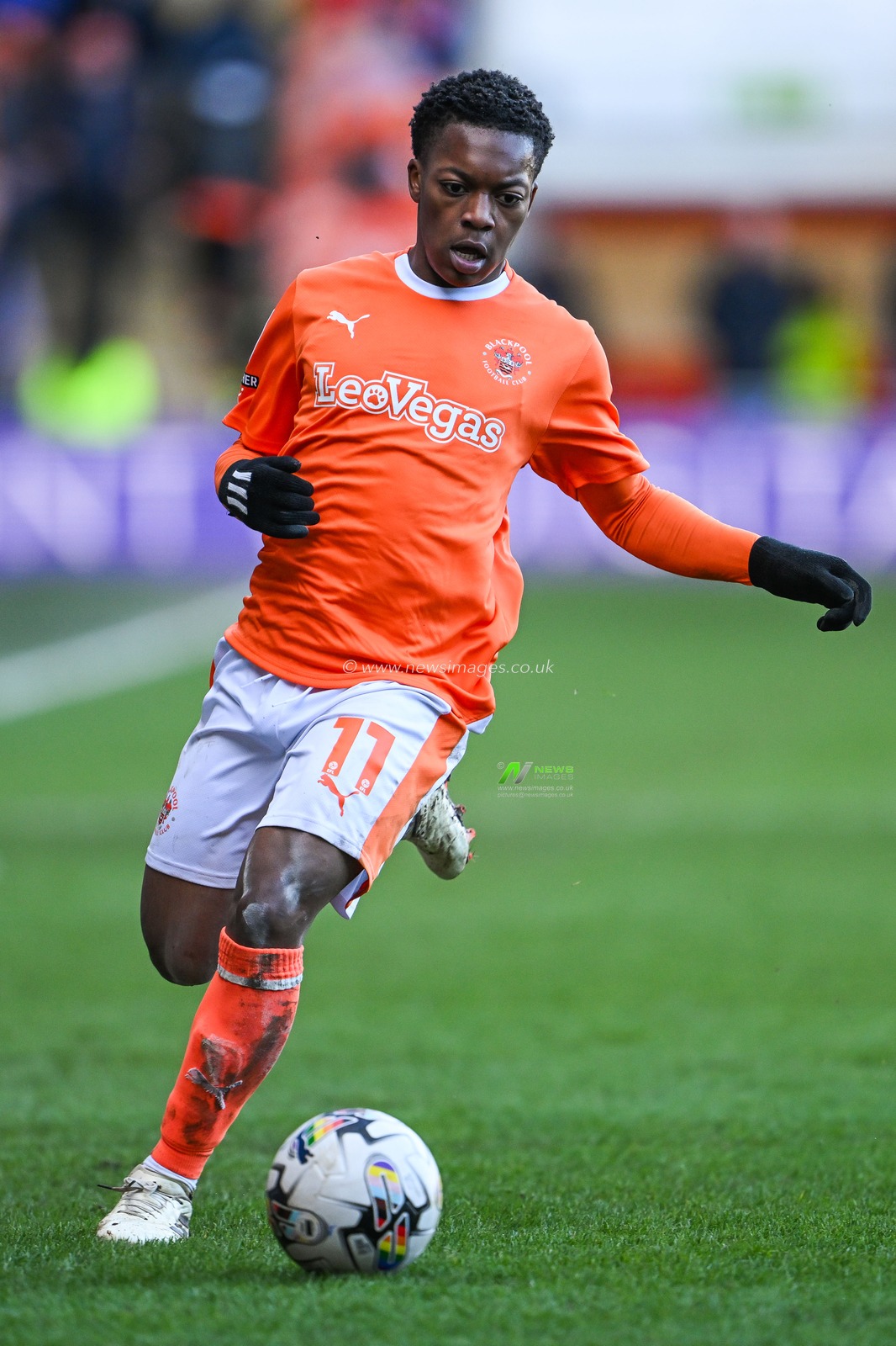 Karamoko Dembele of Blackpool makes a break with the ball during the Sky Bet League 1 match Blackpool vs Bolton Wanderers at Bloomfield Road, Blackpool, United Kingdom, 24th February 2024

(Photo by Craig Thomas/News Images)