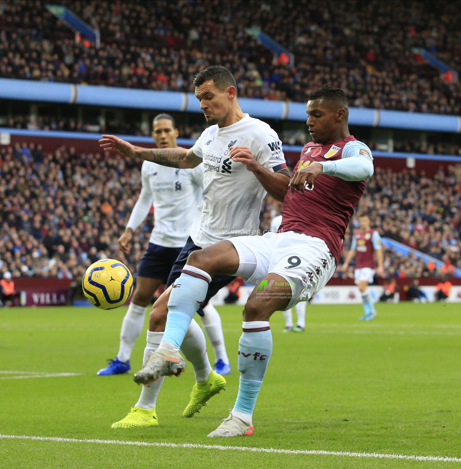 2nd November 2019, Villa Park, Birmingham, England; Premier League, Aston Villa v Liverpool : Wesley (9) of Aston Villa and Dejan Lovren (6) of Liverpool challenge for the ball

Credit: Conor Molloy/News Images