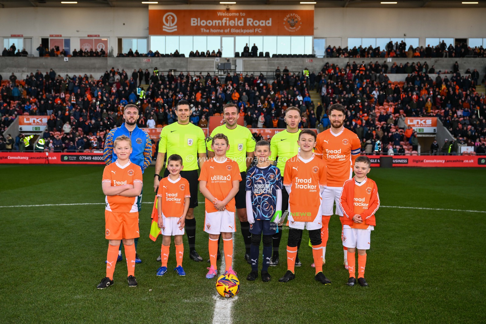 Todays match day mascots with Referee Adam Herczeg and the team captains ahead of the Sky Bet League 1 match Blackpool vs Shrewsbury Town at Bloomfield Road, Blackpool, United Kingdom, 1st January 2025

(Photo by Craig Thomas/News Images)