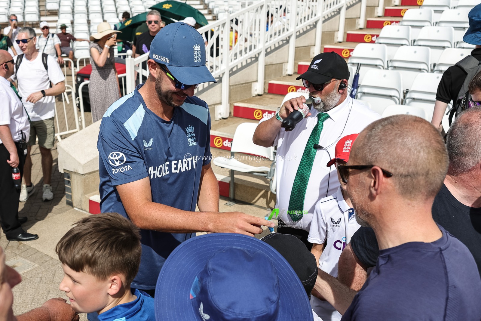 Josh Tongue of England signs a fans hat during the 3rd Rothesay Test Match Day 3 match England vs New Zealand at Trent Bridge, Nottingham, United Kingdom on 27 June 2026

(Photo by Mark Cosgrove/News Images)