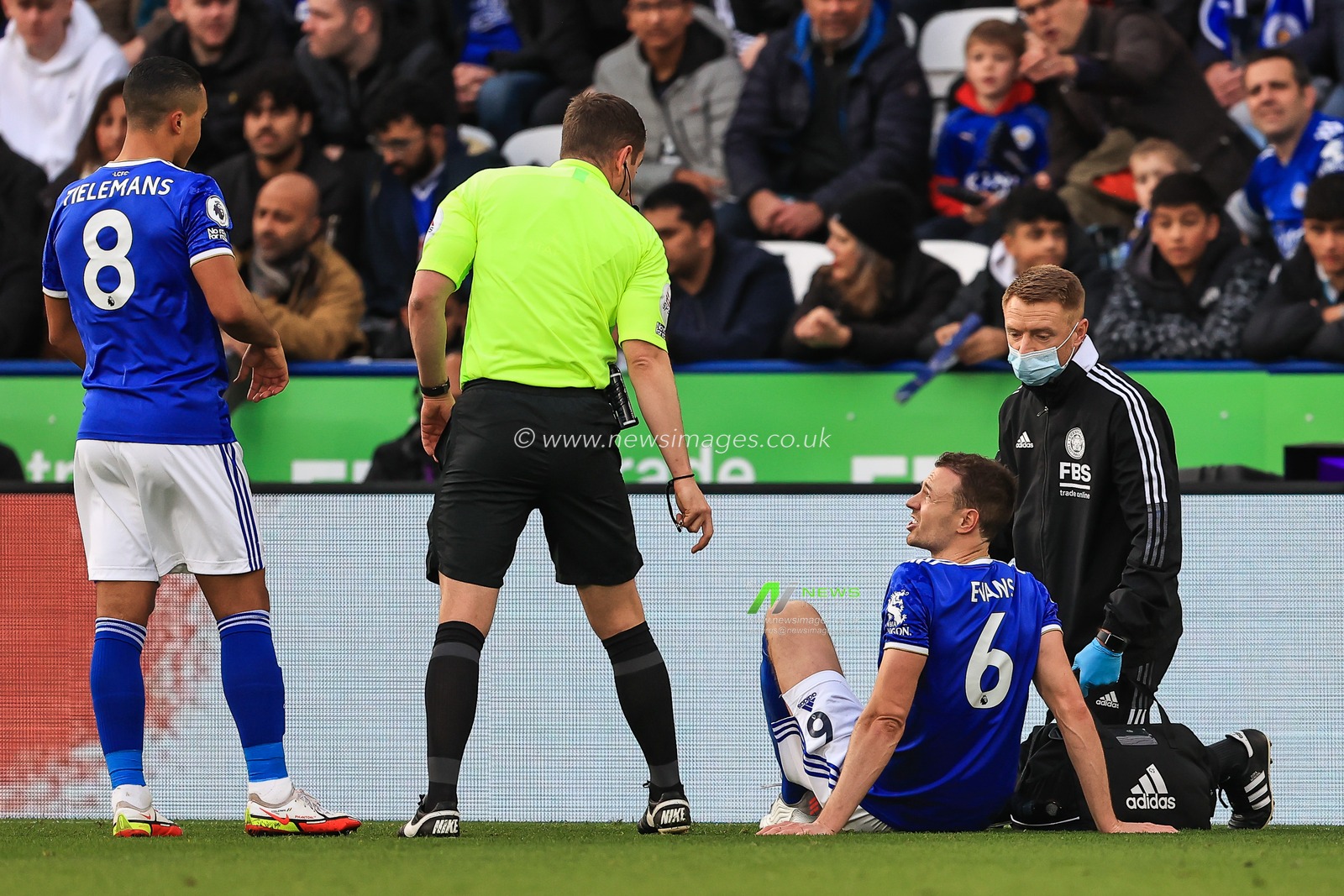 Jonny Evans #6 of Leicester City receives treatment