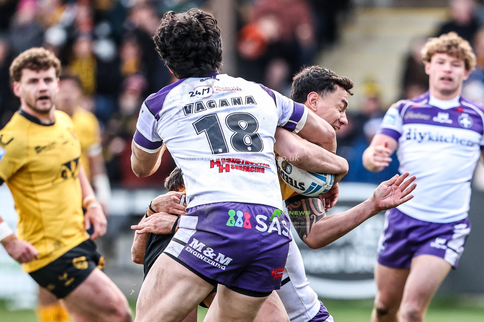 Daejarn Asi of Castleford Tigers is tackled by Isaiah Vagana of Wakefield Trinity during the Betfred Super League round 7 match Castleford Tigers vs Wakefield Trinity at OneBore Stadium, Castleford, Untied Kingdom on 05 April 2026

(Photo by Alfie Cosgrove/News Images)